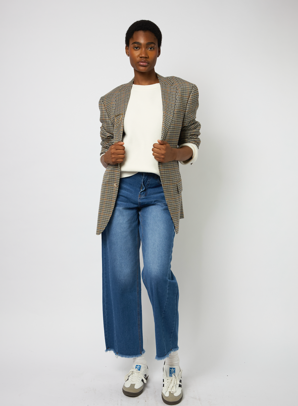 Oversized Vintage Check Print Blazer. All buttons have been replaced with our beautiful holographic buttons. Comes with our new custom designed viens avec moi broach. Fits like a L/XL.