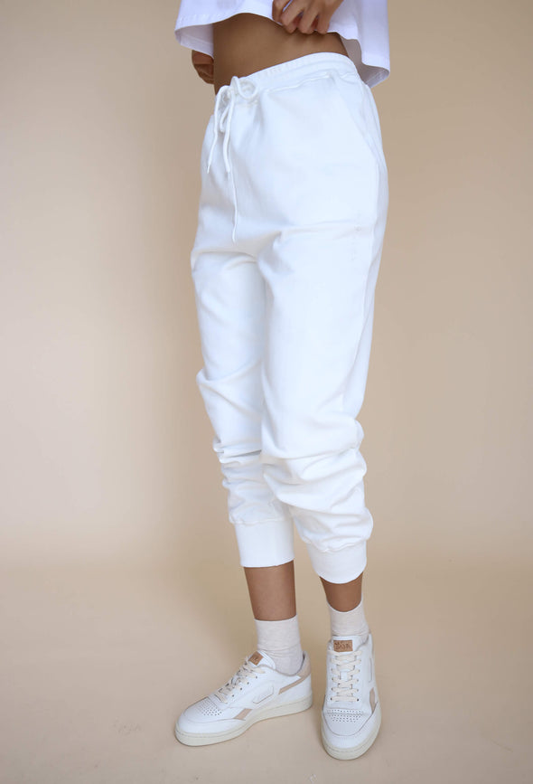 Lightweight jogger pants with drawstring waist, pockets, and cinched ankles.