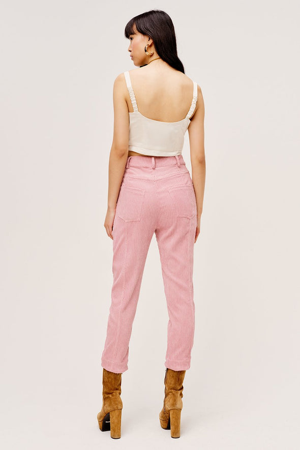 Pink high waisted pants from For Love & Lemons made from corduroy with vintage inspired yolk details.