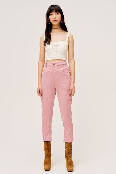 The Carson High Waist Pant by For Love & Lemons are a high waisted pant with vintage yolk details and made from blush corduroy.