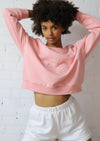 The Lakeside Crew in Pink by Viens Avec Moi is a boxy fit, crew neck sweater made from eco-conscious fabric.