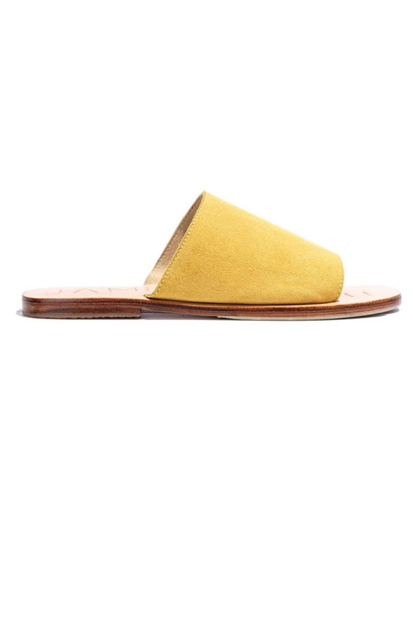 The Off Duty Yellow Suede Slide by James Smith is a perfect summer sandal. The yellow suede upper strap adds a punch of colour