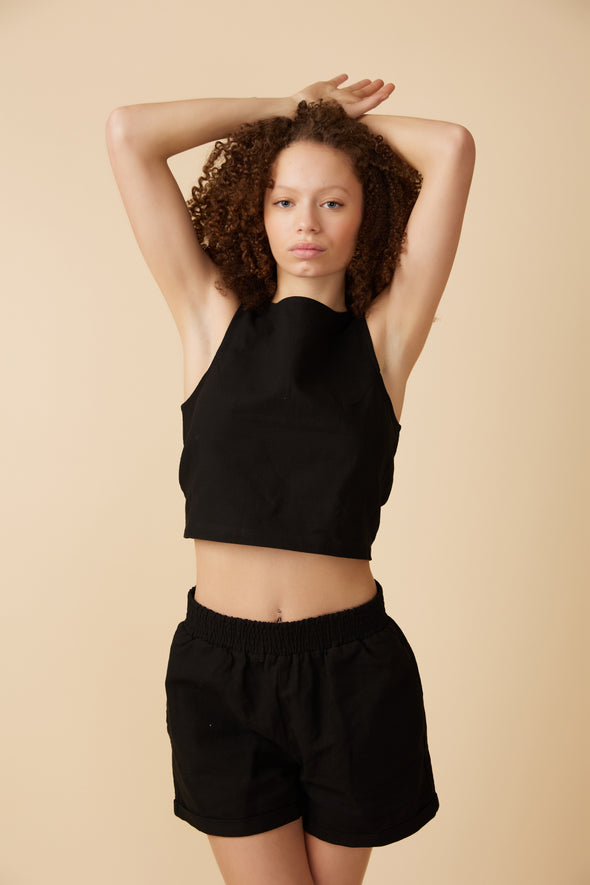 Black womens shorts with a smocked waistband by Canadian clothing brand, Viens Avec Moi.
