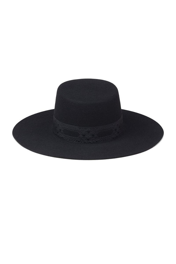 100% Australian wool wide brimmed boater hat from Lack of Color. The black wool hat is embellished with a 1050s vintage ribbon.