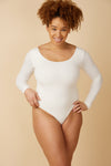 A white long sleeve bodysuit is a capsule wardrobe essential.